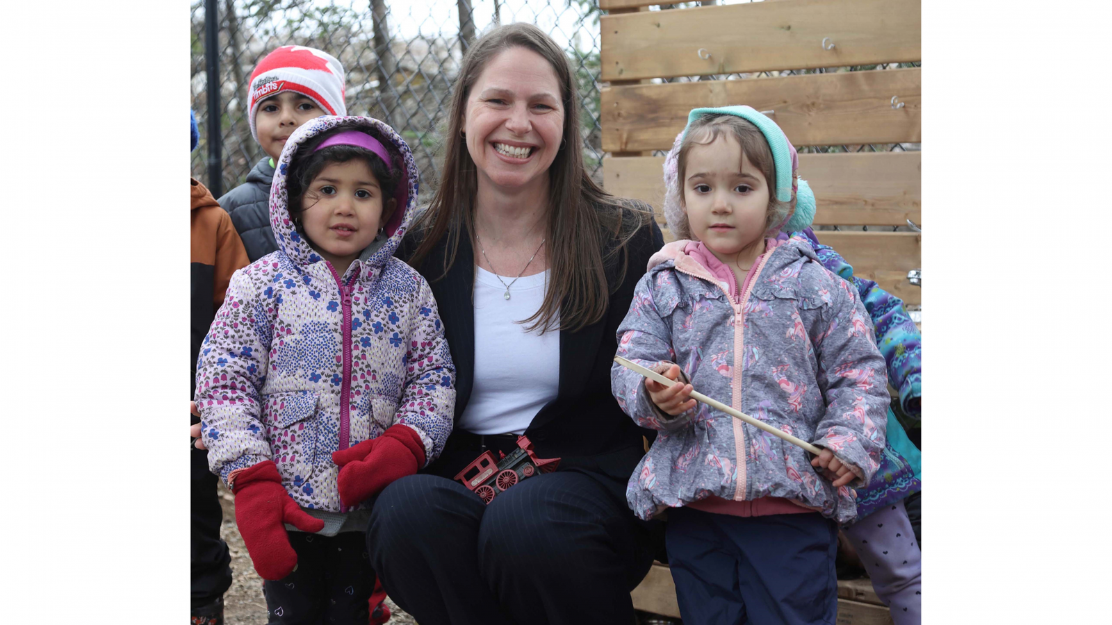 Photo of Education and Early Childhood Development Minister Becky Druhan with children